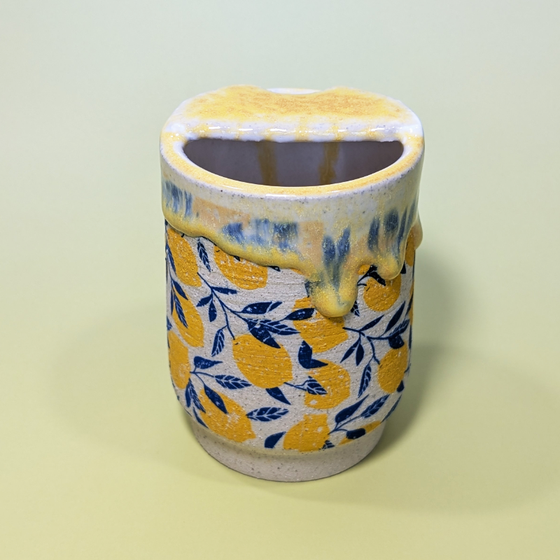 The back of the sippy cup shows where you can pour your drink.