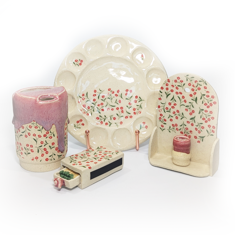 Botanical themed ceramic sippy cup, paint pallet, altar with tiny vase, and matchbox