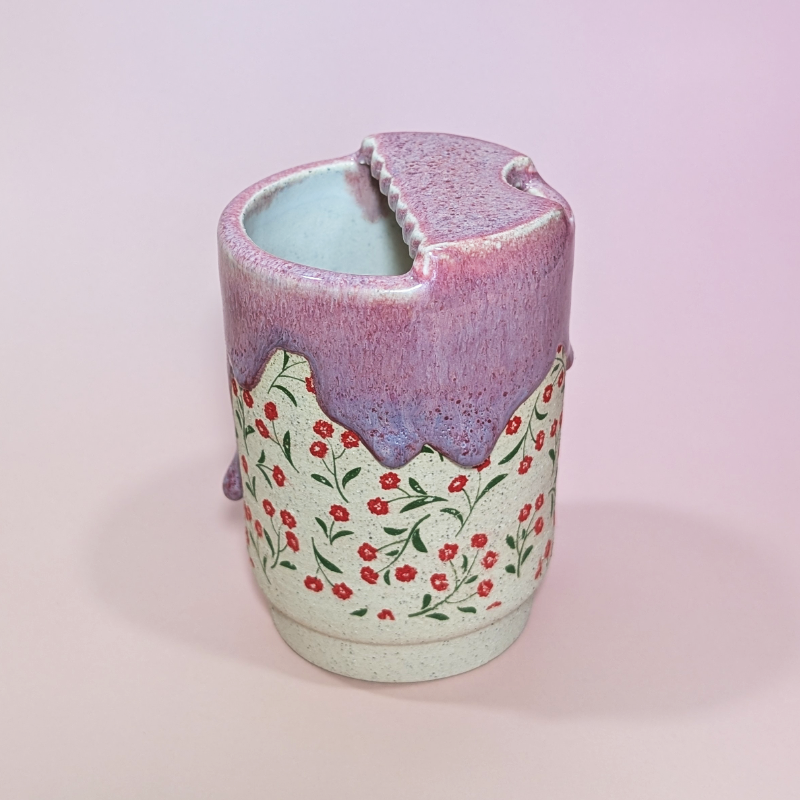 Another side view of the poppy themed sippy cup.