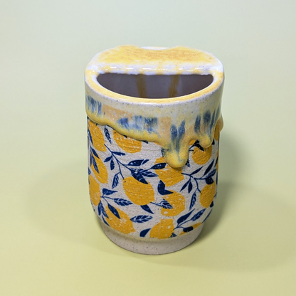 The back of the sippy cup shows where you can pour your drink.